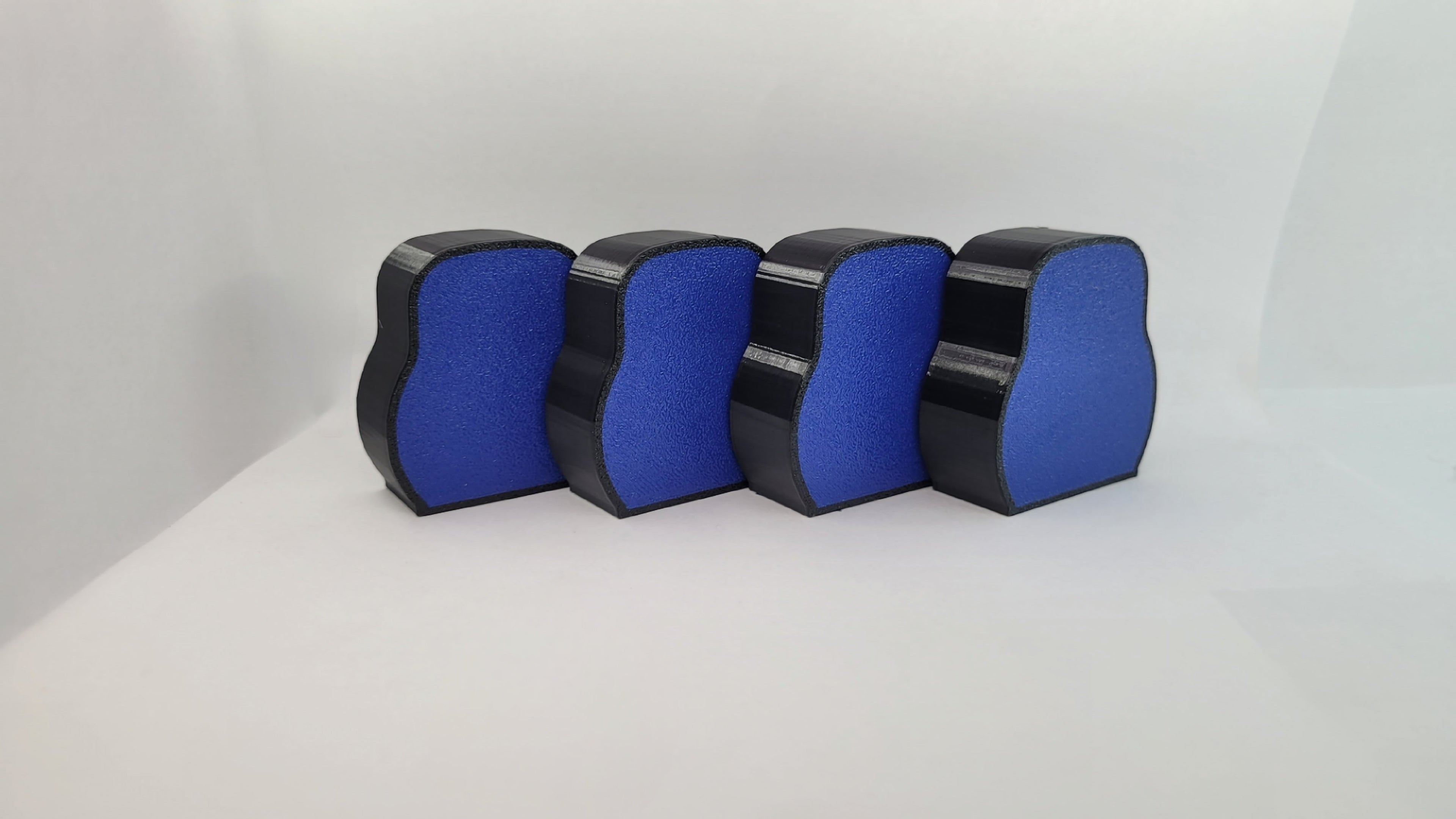 Display of Random Colored Set of 4 Coil Covers